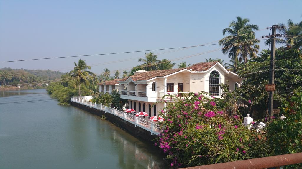 Hotel Riverside Baga Exterior photo